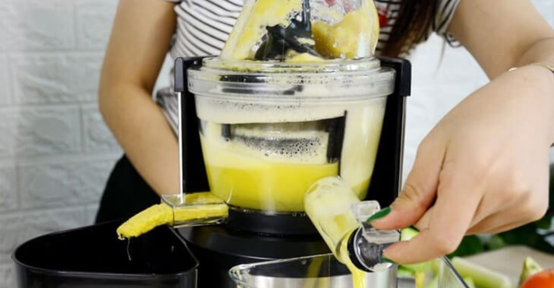 cách mở máy ép trái cây bị kẹt