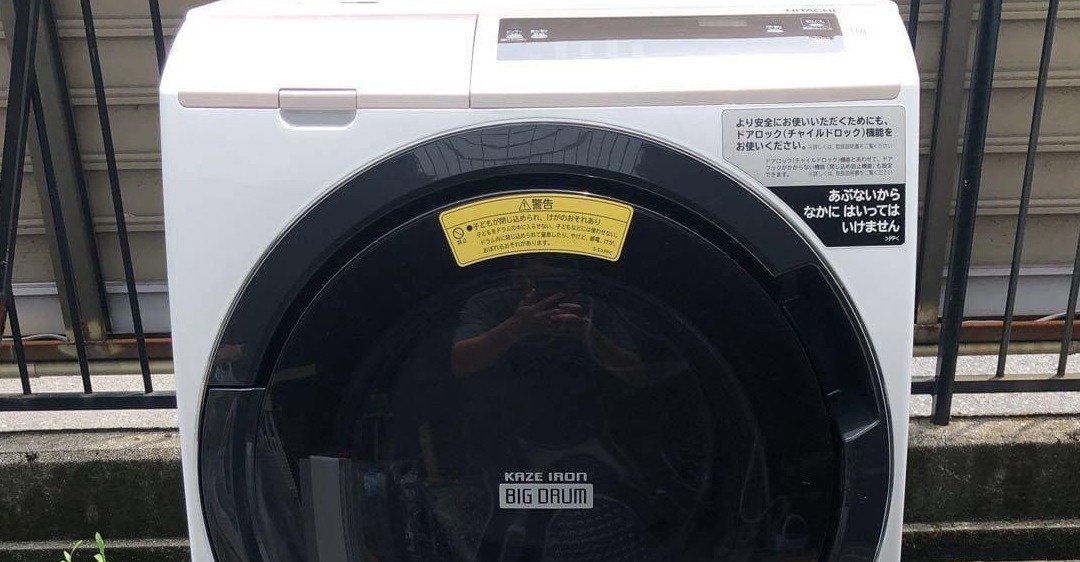 máy giặt hitachi không mở được cửa