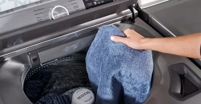 nguyên nhân máy giặt bị đọng nước