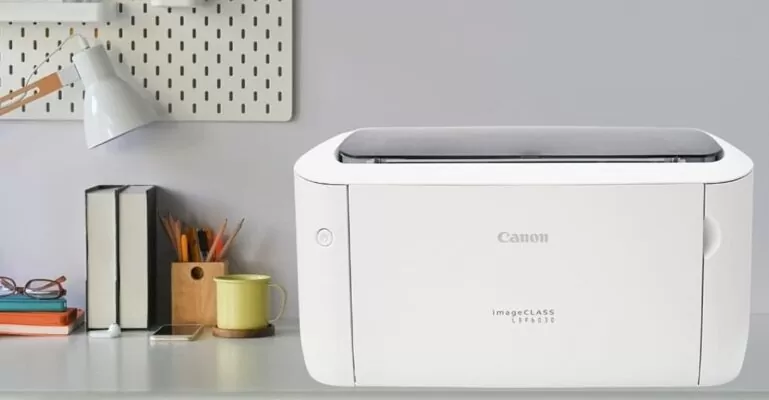 lỗi máy in in bị đen giấy