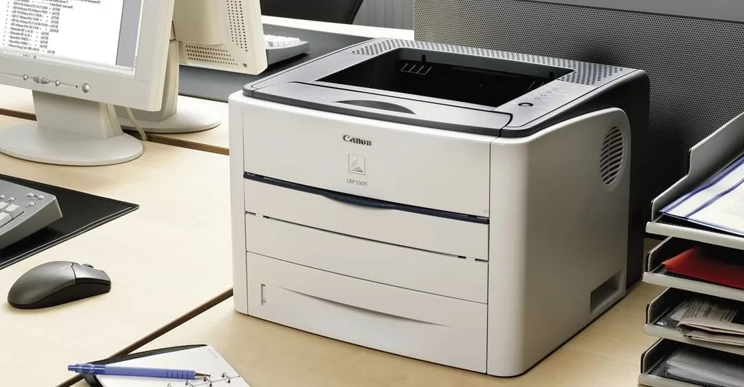 nguyên nhân máy in bị đen nền