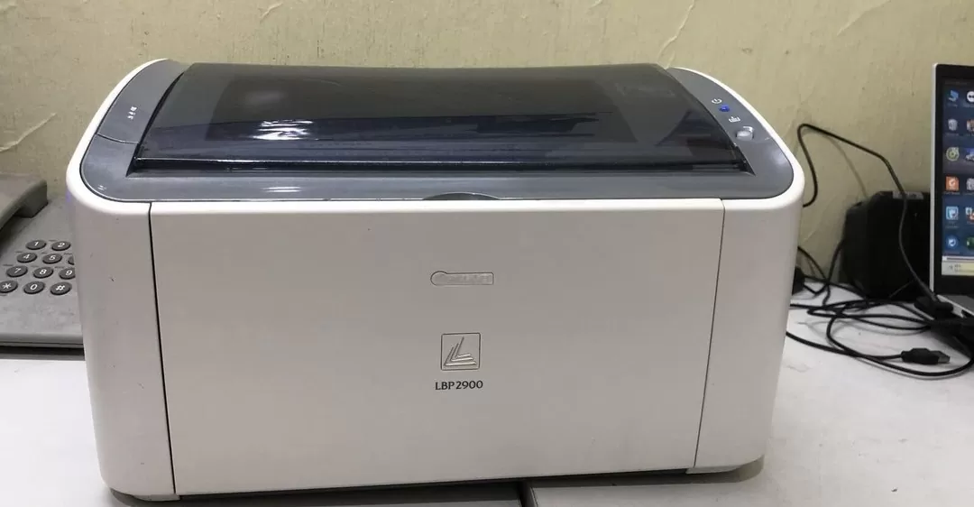 nguyên nhân máy in canon 2900 bị lem mực