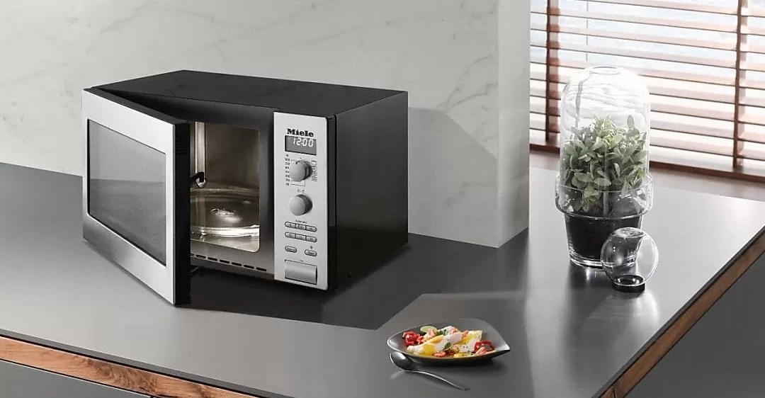 sửa lò vi sóng bị rò điện