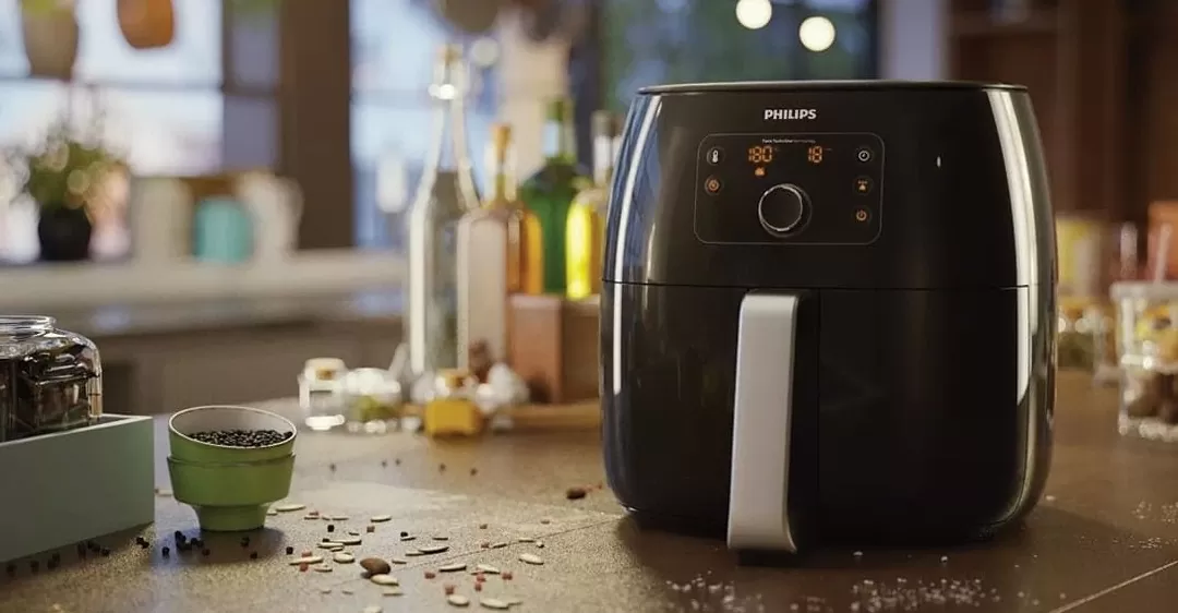 sửa nồi chiên không dầu bị rỉ sét