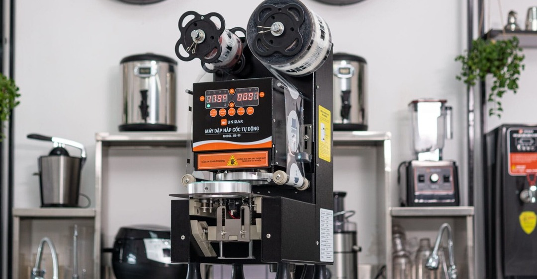 sửa máy dập cốc tự cuộn màng