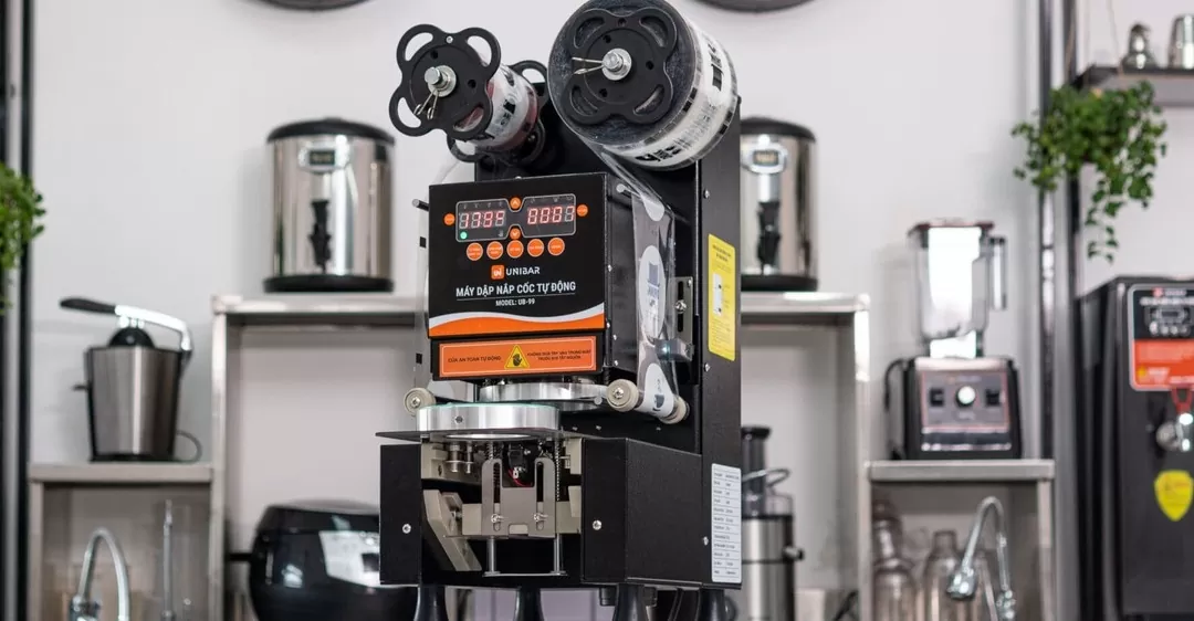 sửa máy dập cốc tự cuộn màng