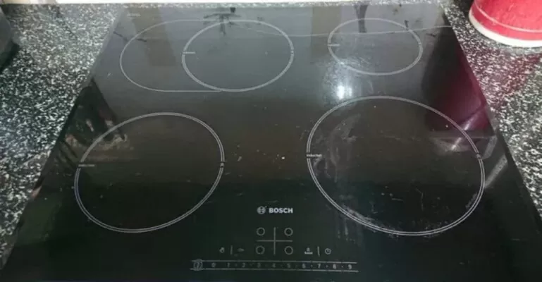 thay mặt kính bếp từ bosch